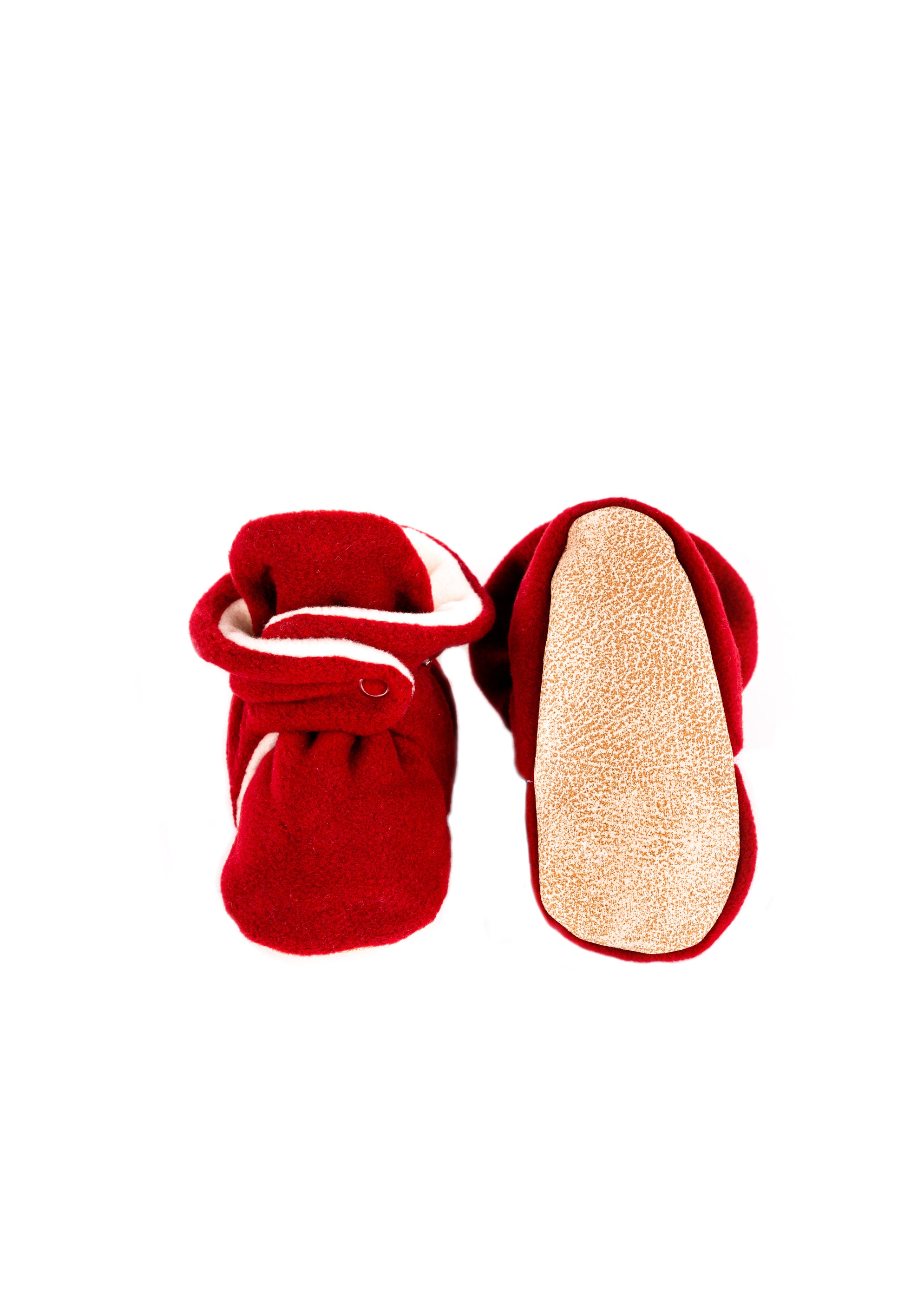 Comfortable and breathable baby booties in burgundy color with non-slip soles for safe adventures. 