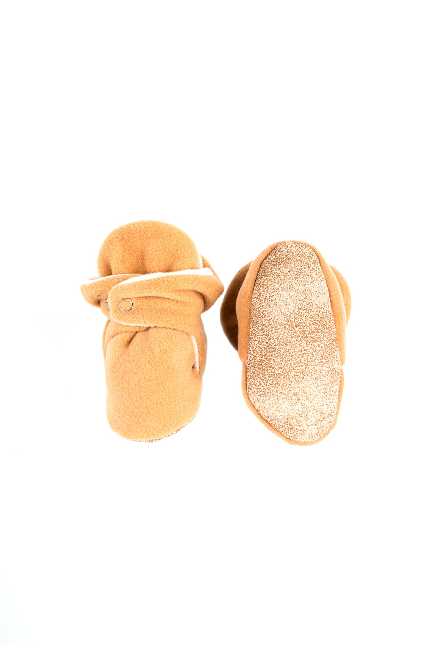 Comfortable and breathable baby booties in camel with non-slip soles for safe adventures.