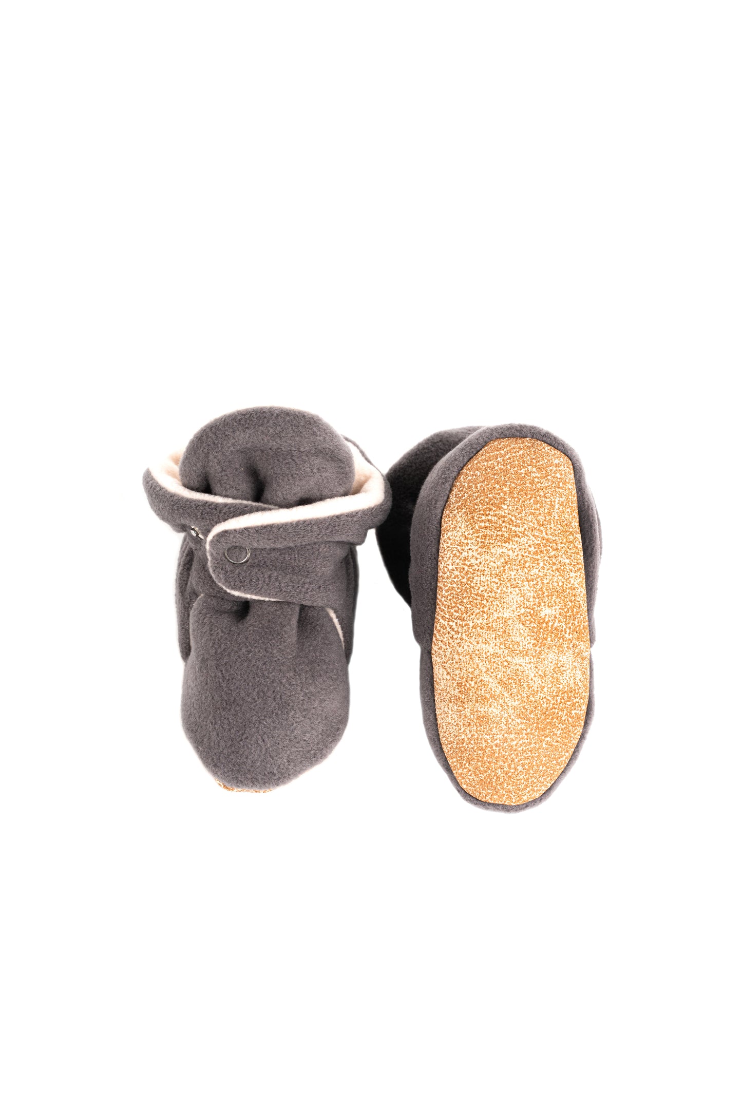 Comfortable and breathable baby booties in gray with non-slip soles for safe adventures.